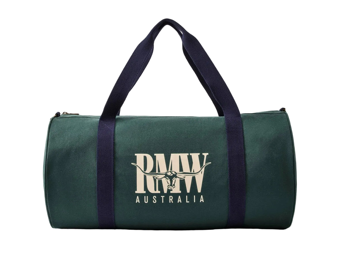A dark green canvas duffel bag with navy blue handles and a cream-colored 'RAW AUSTRALIA' logo printed on the front, set against a plain light gray background.